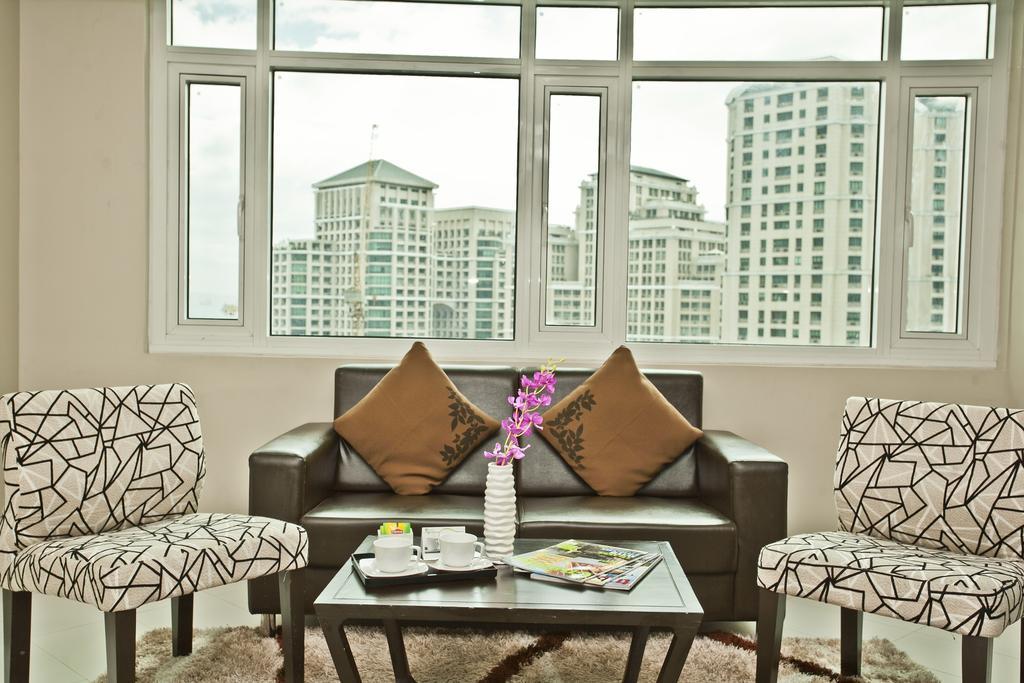 The Exchange Regency Residence Hotel Managed By Hii Pasig City Rom bilde