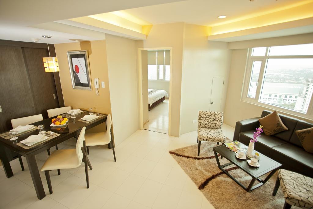 The Exchange Regency Residence Hotel Managed By Hii Pasig City Rom bilde