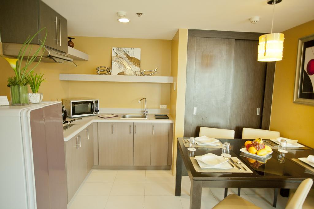 The Exchange Regency Residence Hotel Managed By Hii Pasig City Rom bilde